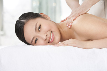 Fototapeta na wymiar Young woman getting a massage