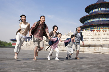 Happy family travelling at Temple of Heaven in Beijing, China