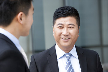 Fototapeta premium Smiling businessmen