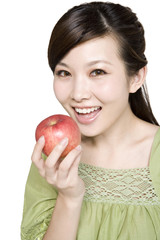 Portrait of Young Woman with Red Apple