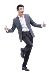 Fashionable businessman doing thumbs up