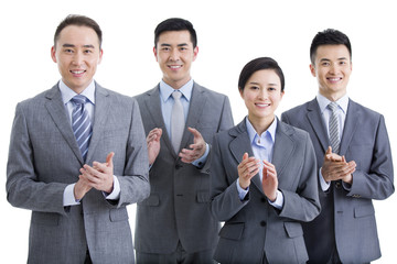 Cheerful business team clapping