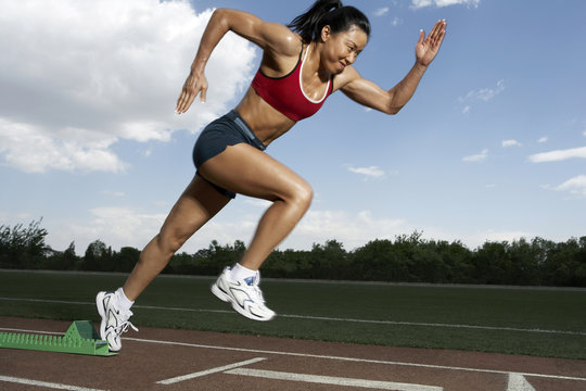 Athlete Running Track