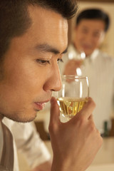 Man Drinking Wine In Bar