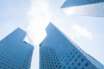 Obraz na płótnie Canvas Skyscraper building at singapore - blue whitebalance processing