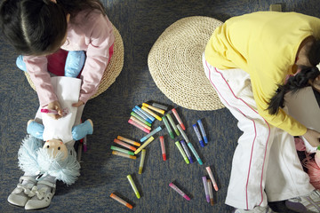Girls Sitting In Classroom Drawing