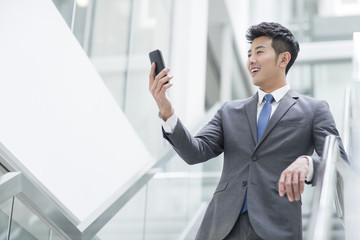 Businessman using smart phone