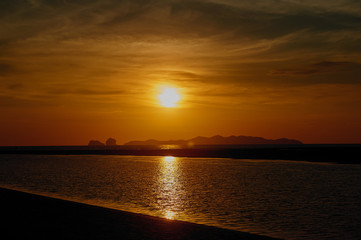 Picturesque sea view with sunset and horizon line in Andaman sea near Phuket