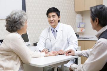 Fototapeta premium Senior doctors giving massaging