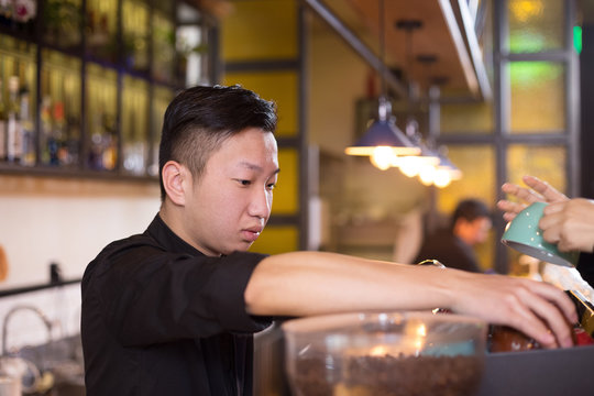 waiter serving in cafe