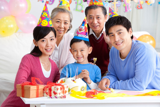 Young Chinese boy's birthday with family