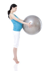 Fototapeta premium Young pregnant woman and fitness ball