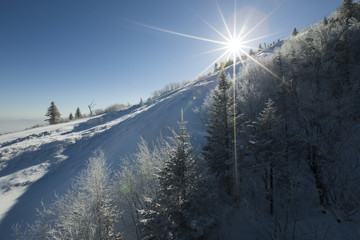 Sun shining on snow, China