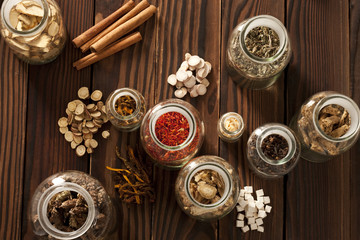 Various Chinese medical herbs in jars