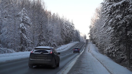 winter snowy road going cars - Powered by Adobe