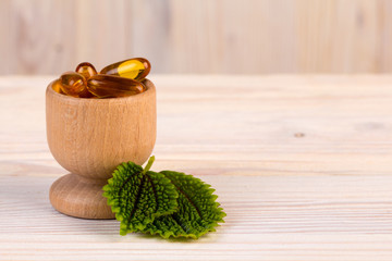 Alternative homeopathic medicine in wooden container