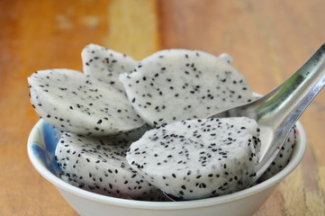 dragon fruit slice on spoon