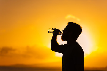  Male drinking water
