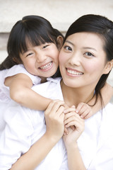 Portrait of mother and daughter