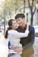 Fototapeta premium Happy young couple embracing