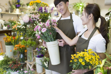 Florists working in shop