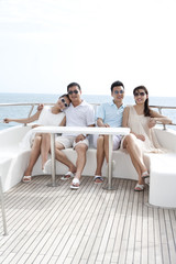 Friends Relaxing on a Yacht