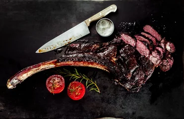 Poster BBQ tomahawk steak sliced through © exclusive-design