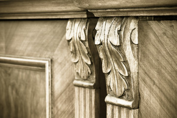 Detail of an antique italian furniture just restored