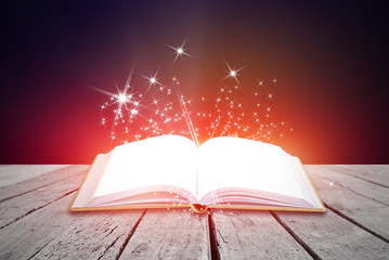 Abstract magic book on wooden background
