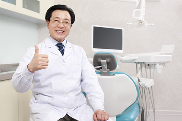 Dentist in dental clinic