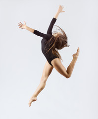 Fototapeta premium Young girl engaged art gymnastic