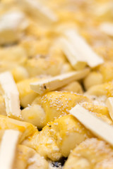 Rolls prepared for baking with margarine