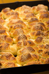 Fresh and hot baked rolls on the plate