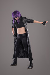 Woman with gun / Portrait of sexy woman posing in studio with gun