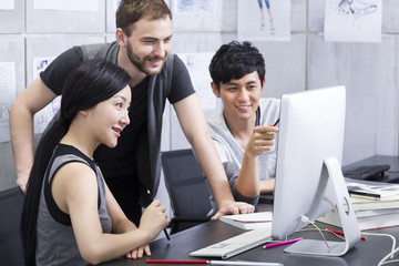 Young adults discussing in office