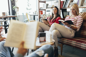 Friends reading books
