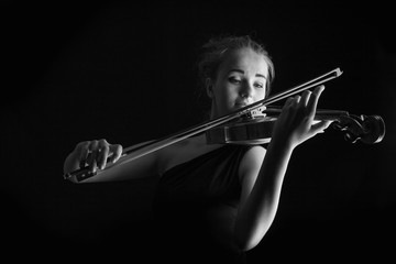 Young woman playing violin