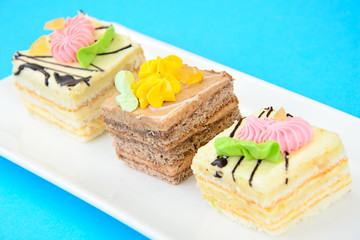 Sweets: Cream Cakes on Plate
