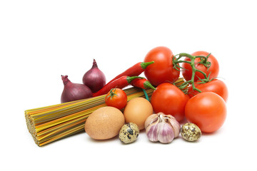 vegetables, eggs and spaghetti on a white background