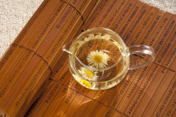 Close-up of Chrysanthemum Tea and bamboo slip
