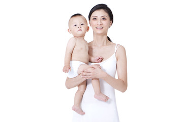 Young mother and infant looking at view