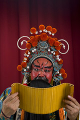 Fototapeta premium Guang Gong, Ancient Chinese General in Beijing Opera Costume, Represents Protection and Wealth