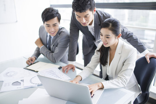 Young business person talking in meeting