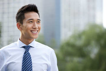 Confident Businessman Standing Outdoors