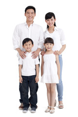 Fototapeta premium Portrait of a happy family with two children