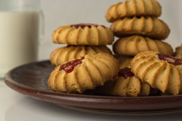 Kurabe homemade cookies on a plate and milk