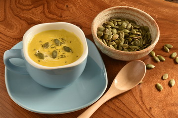 Pumpkin soup in a blue bowl