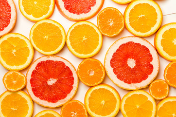 Fresh Grapefruit juicy slices. Rich with vitamin C isolated on white background