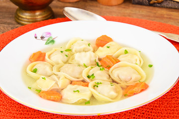 Delicious Food: Soup Dumplings Pelmeni and Carrot