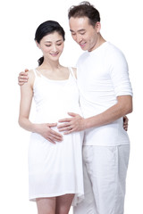 Fototapeta premium Happy young couple expecting a baby